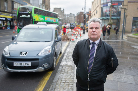 Raymond Noble at the Steeple Church taxi rank.