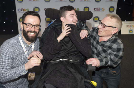 Pictured is Adam Meldrum, from Kirkcaldy, with James Mackenzie (Raven) and Jimmy Vee who played R2D2 in the Star Wars movies.