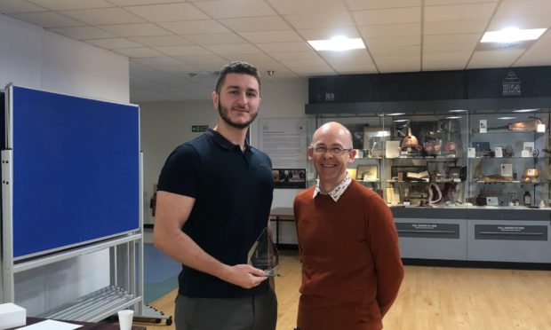 Omar Kouli with Andrew Martindale, the college’s regional surgical adviser for east of Scotland.