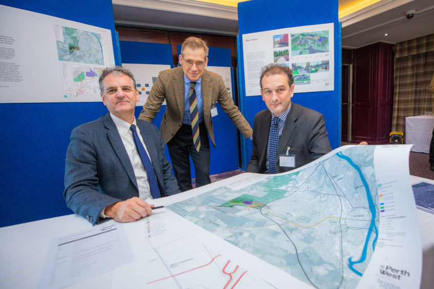 Alexander Dewar, right, at a Perth West development public consultation, along with Gavin Murray of Brooks Murray and Mark Richardson of Ristol Consulting. The three men are standing behind a large map showing the development site.