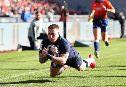 Scotland's Stuart Hogg scores his side's first try.