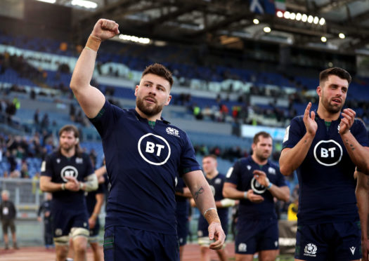 Scotland's Ali Price and Adam Hastings celebrate the victory in Rome.