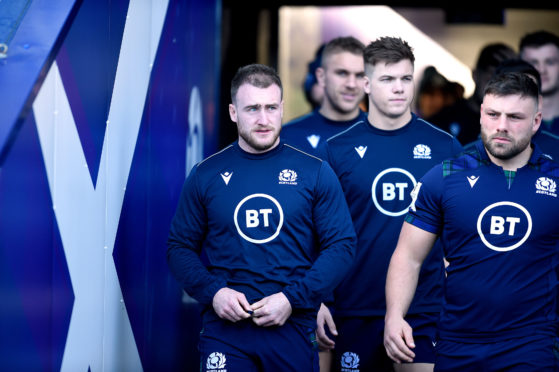 Captain Stuart Hogg (left) leads out the Scotland team for the captain's run at Murrayfield ahead of the Scotland-England game in February.