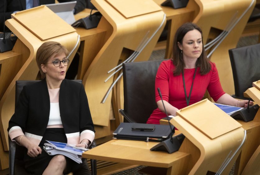Nicola Sturgeon and Kate Forbes in the Scottish Parliament.