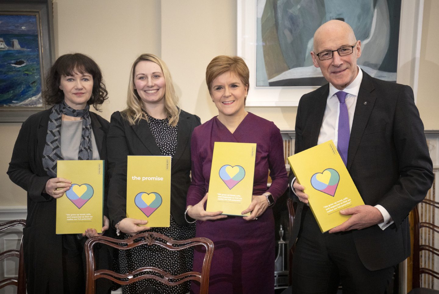 Chair Fiona Duncan, panel member Laura Beveridge, First Minister Nicola Sturgeon and Deputy First Minister John Swinney with copies of the Independent Care Review report at Bute House, Edinburgh.