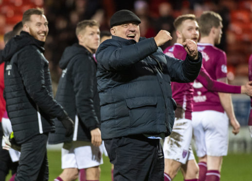 Arbroath boss Dick Campbell celebrates their win at Tannadice.