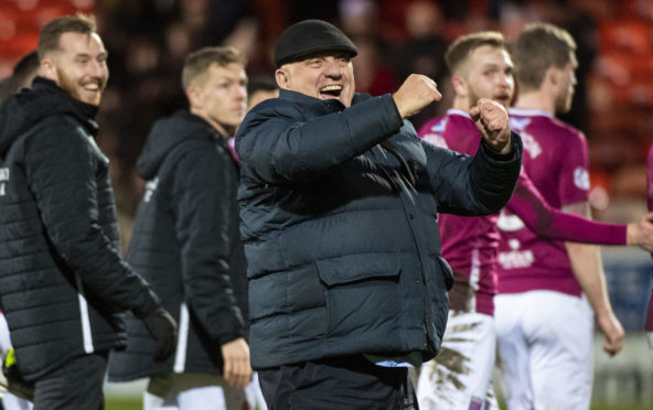 Arbroath boss Dick Campbell celebrates their win at Tannadice.