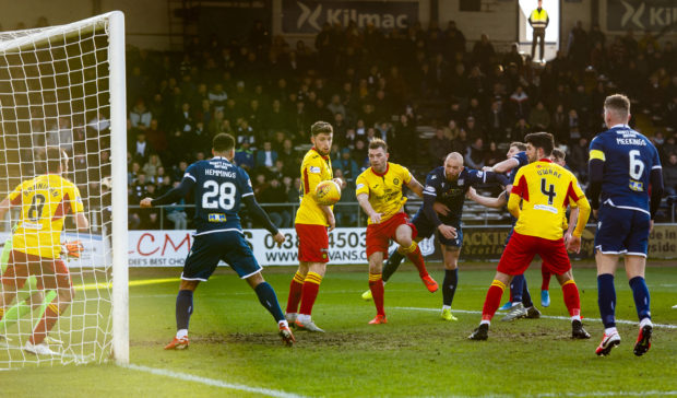 Kane Hemmings (28) gets ready to nick the opening goal.