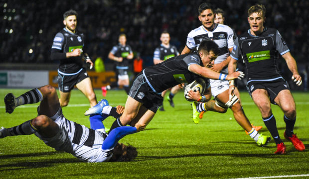 George Horne scores his second try of the night for Glasgow.