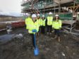 Fife Labour councillor Judy Hamilton marked the start of work to build new council houses in Inverkeithing.
Judy Hamilton, front, with, from left, Debbie Ford of Fife Council, Pauline Mills of Taylor Wimpey, Helen Wilkie of Fife Council, and Kenny Gorman and Abby Kelman of Taylor Wimpey.