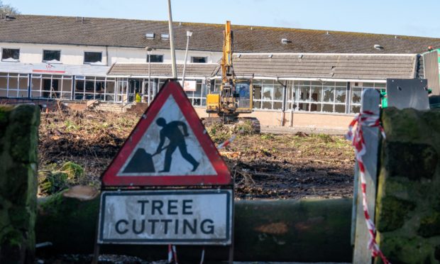 Trees ripped from ground as demolition begins on the Windlestrae hotel