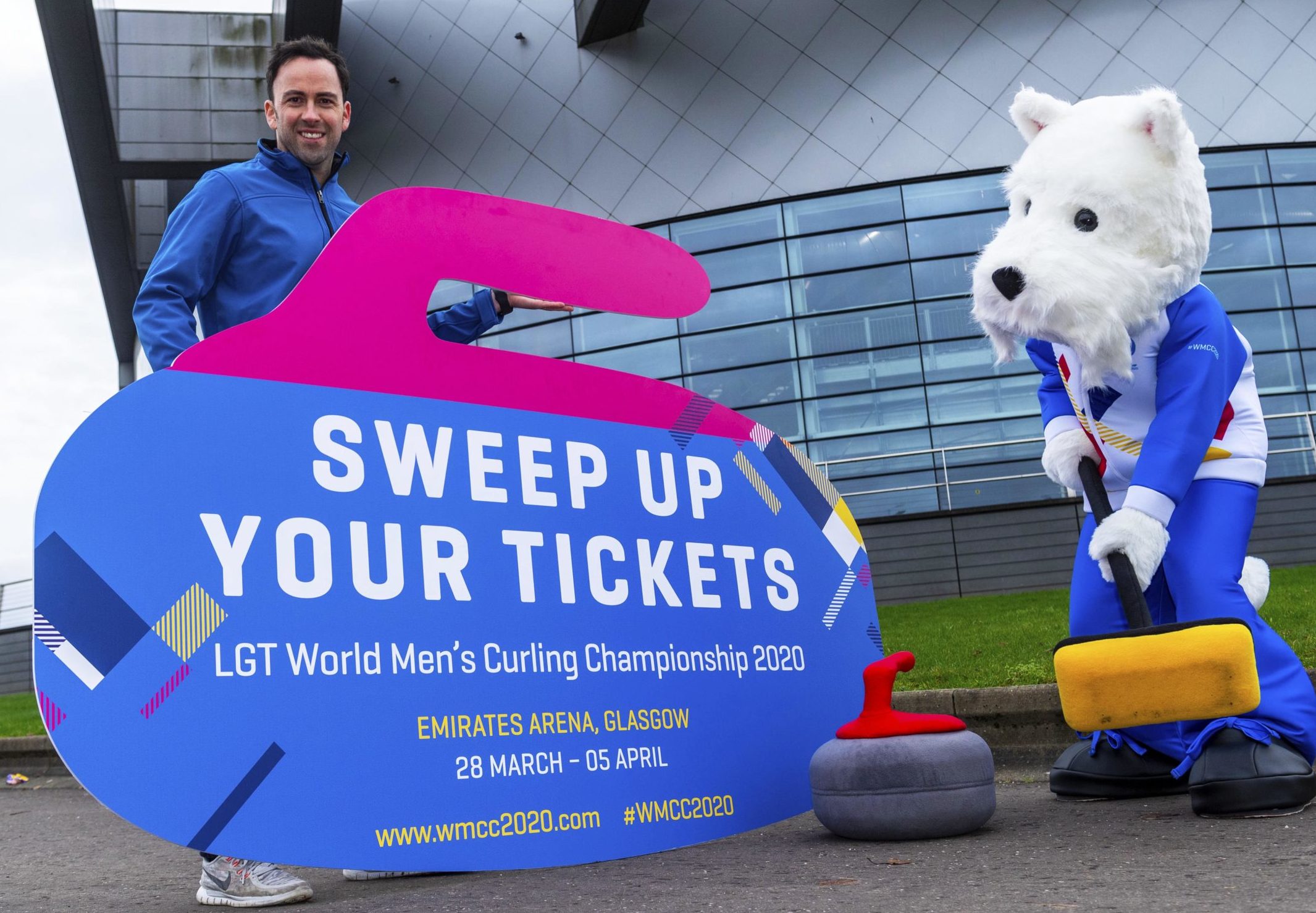 British Curling National Coach David Murdoch and Sweep the mascot at the Emirates Arena.