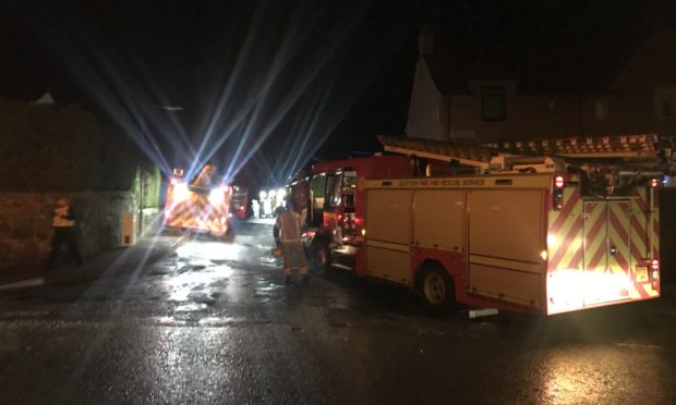 Firefighters at the scene of the Leslie blaze.