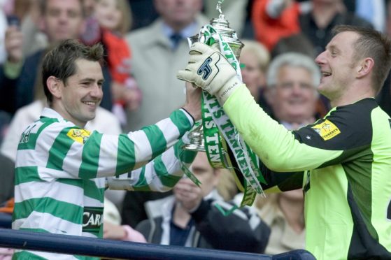 Jackie McNamara celebrates a cup triumph with Rab.