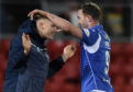 The two goalscorers against Motherwell celebrate at full-time.