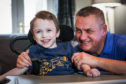 Cameron Gilmour, 4 with his dad Jim.