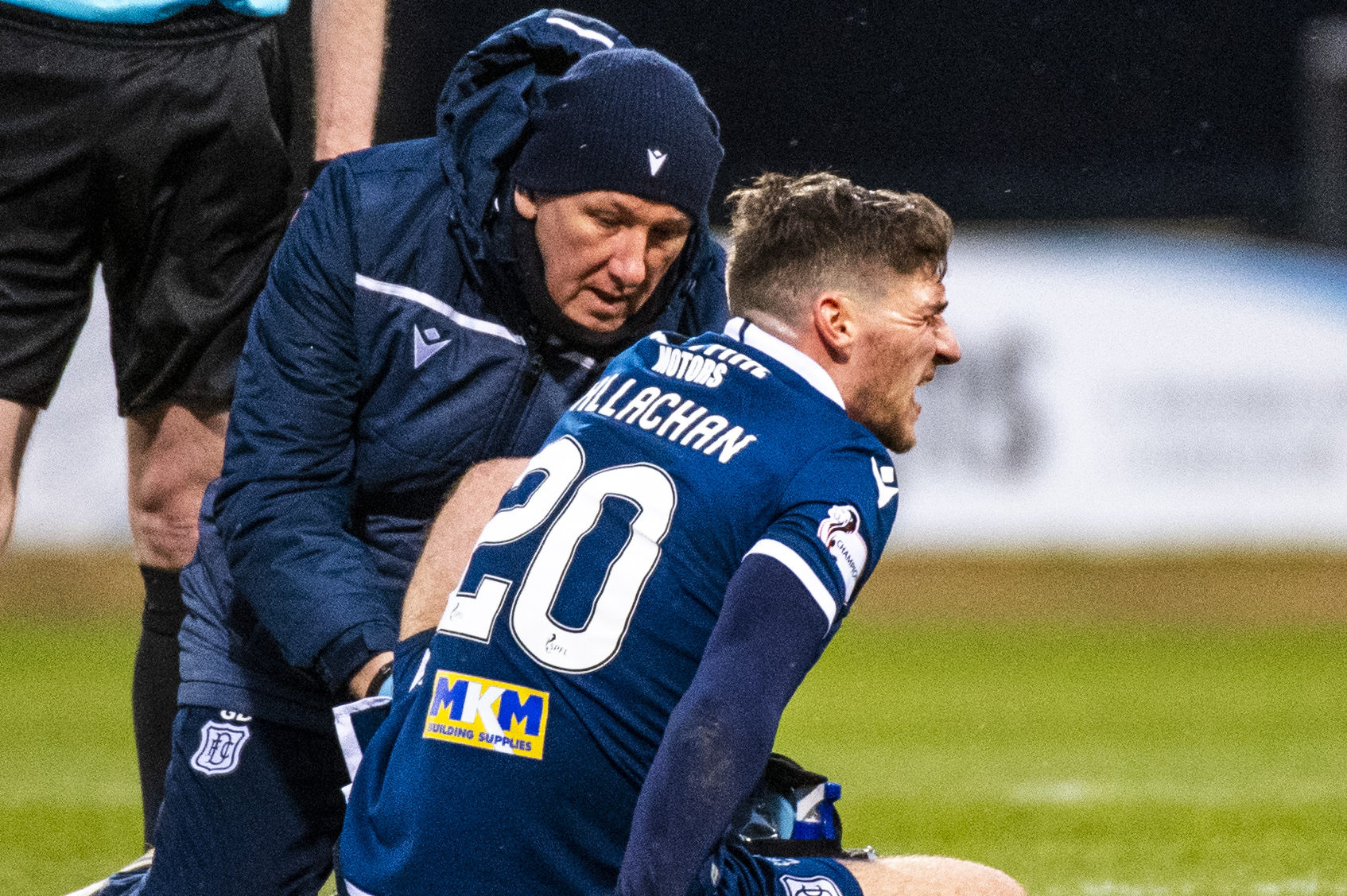 DUNDEE, SCOTLAND - FEBRUARY 08: Dundee's Ross Callachan goes down injured during the Ladbrokes Championship match between Dundee and Partick Thistle at the Kilmac Stadium at Dens Park on February 08, 2020 in Dundee, Scotland. (Photo by Euan Cherry / SNS Group)