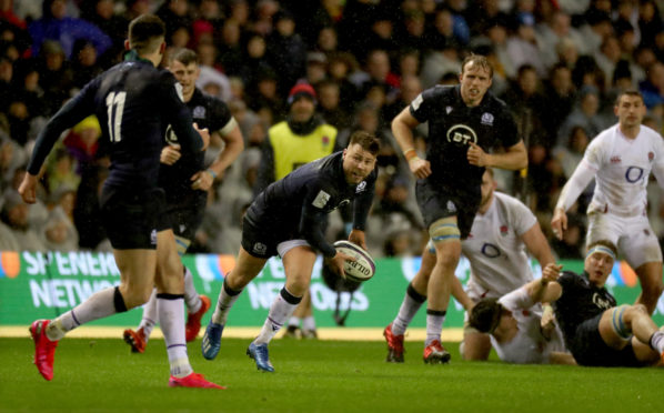 Ali Price tries to launch a Scotland attack against England.