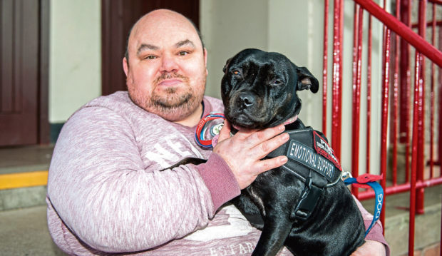 John Johnson and his support dog Poppy.