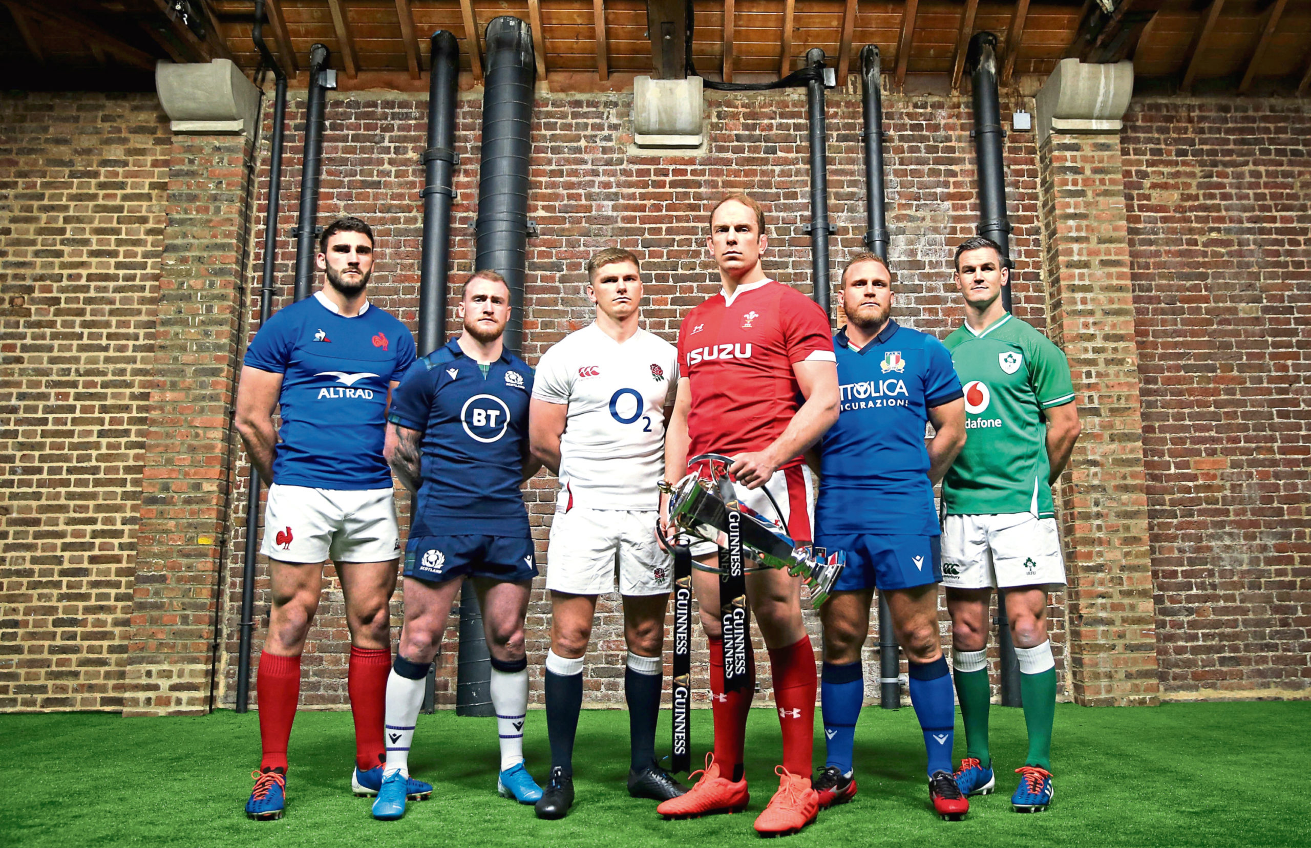 Team captains pose for a photo with the Six Nations Trophy (left to right) France's Charles Ollivon, Scotland's Stuart Hogg, England's Owen Farrell,  Wales' Alun Wyn Jones, Italy's Luca Bigi and Ireland's Jonathan Sexton during the Guinness Six Nations launch at Tobacco Dock, London. PA Photo. Picture date: Wednesday January 22, 2020. See PA story RUGBYU Six Nations. Photo credit should read: Steven Paston/PA Wire. RESTRICTIONS: Editorial use only. No commercial use.