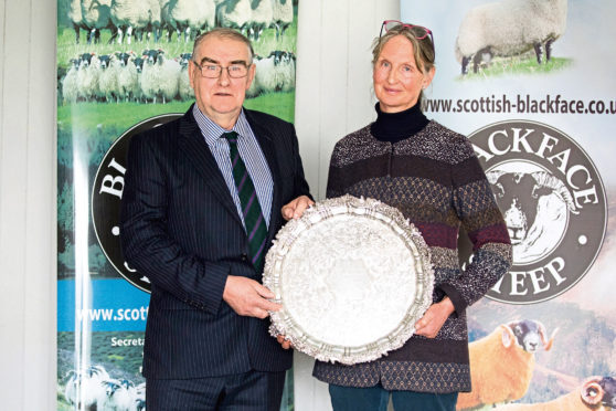 William Dunlop gets the Connachan Salver from Mary McCall Smith for his ‘‘work ethic and integrity’’.