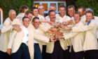 Mandatory Credit: Photo by Adrian Dennis/EPA/Shutterstock (7650925bk)
Sutton Coldfield United Kingdom : European Team Captain Sam Torrance (c) Hold the Ryder Cup As His Team Surrounds Him After They Won the 34th Ryder Cup 29 September 2002 on the Brabazon Course at the Belfry in Sutton Coldfield England the Europeans Won the Ryder Cup15 1/2 To12 1/2
VARIOUS - Sep 2002