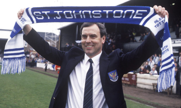 St Johnstone manager Alex Totten celebrates winning the first division in 1990.