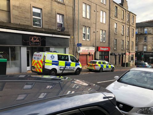 Police outside the Albert Street flats on November 6 last year