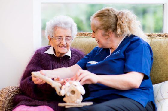 A Balhousie Care Group staff member and resident