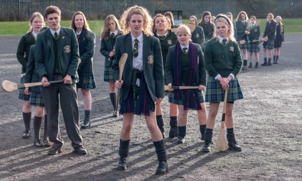 The Derry Girls.  James (Dylan Llewellyn), Erin (Saoirse Monica-Jackson), Michelle (Jamie-Lee O'Donnell), Clare (Nicola Coughlan) and Orla (Louisa Clare Harland)