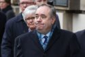 Alex Salmond leaves the High Court in Edinburgh after he was cleared of all charges.