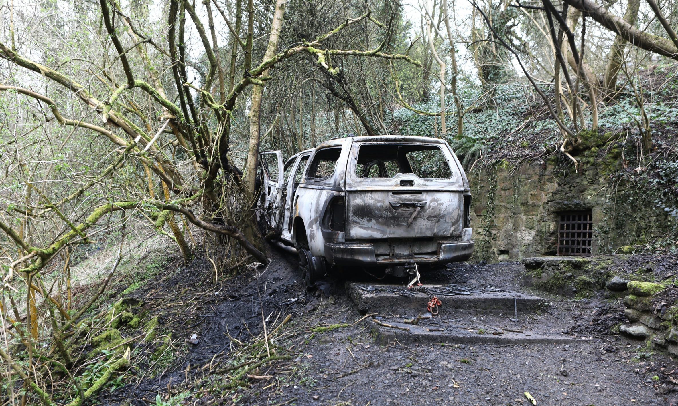 The burnt out car in Kennoway Den, Fife.