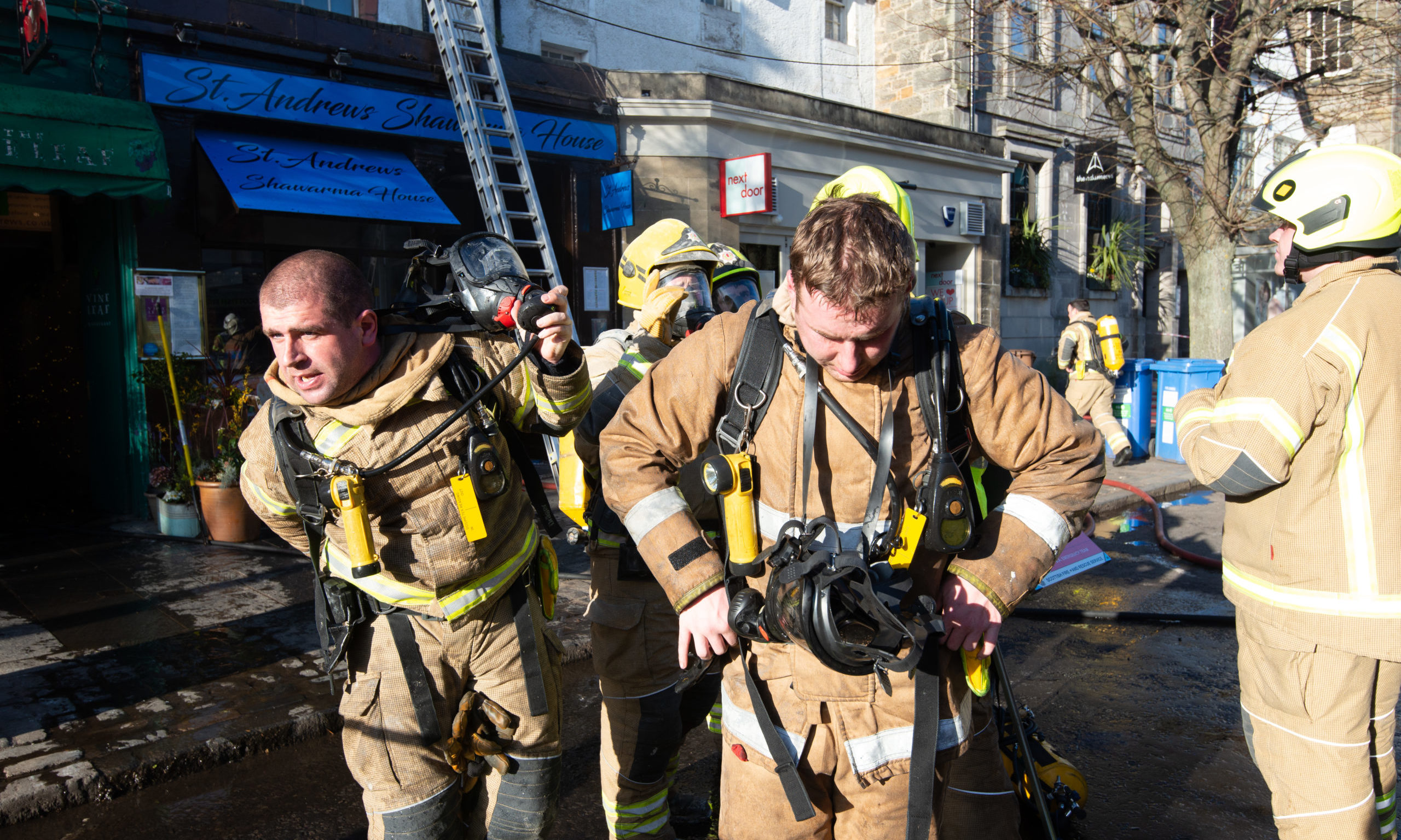 Firefighters at the scene of the blaze on South Street, St Andrews.