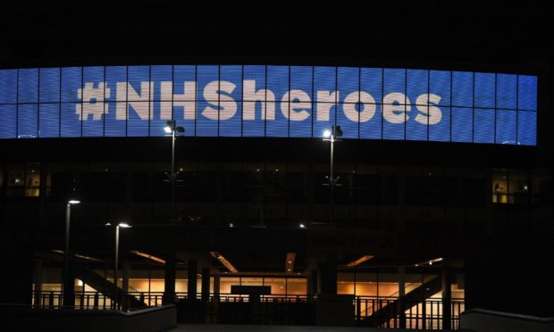 Wembley Arch is illuminated in blue to show its appreciation to the NHS amid the coronavirus outbreak.