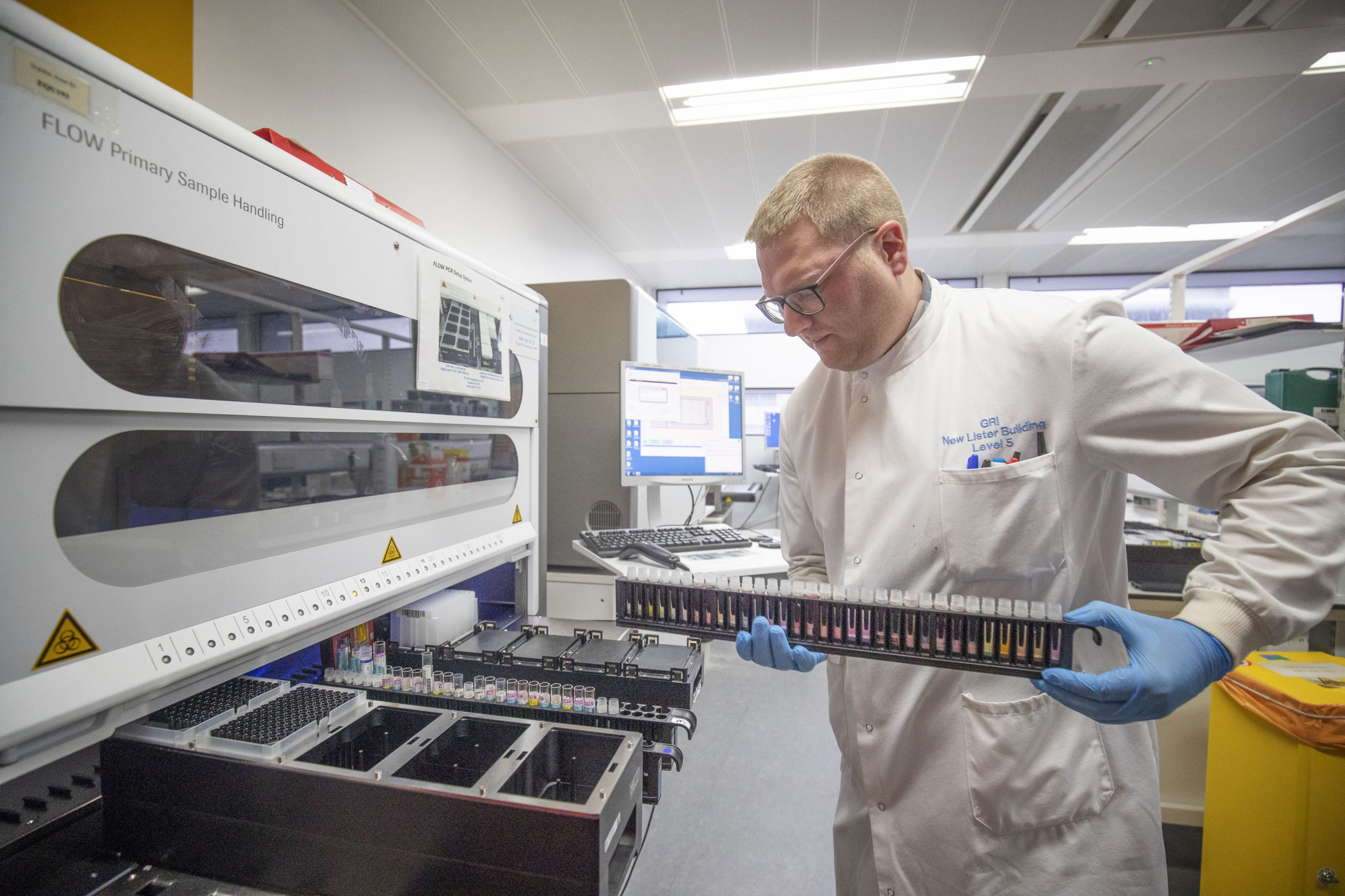 Clinical support technician Douglas Condie extracts viruses from swab samples so that the genetic structure of a virus can be analysed and identified in the coronavirus testing laboratory at Glasgow Royal Infirmary, Glasgow.