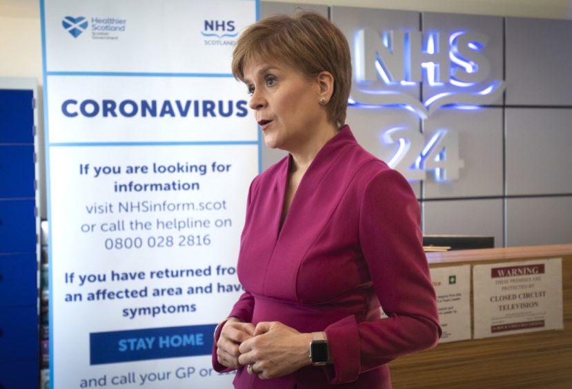 First Minister Nicola Sturgeon speaking during a visit to the NHS 24 contact centre at the Golden Jubilee National Hospital in Glasgow to meet staff supporting Scotland's public information response to coronavirus (COVID-19).