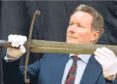 Lord Bruce with sword of his ancestor, King Robert.