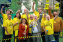 Neale Hanvey and supporters celebrate after his General Election victory.