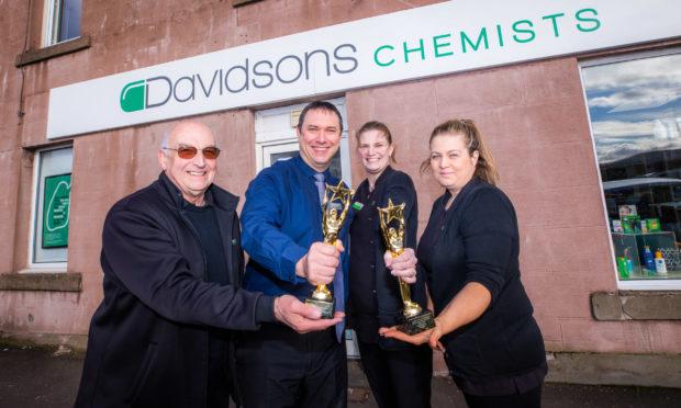 Delivery driver Peter Thomson, manager Andrew Watson and pharmacy assistants Jaime Rodger and Nicola Smith have celebrated the win.