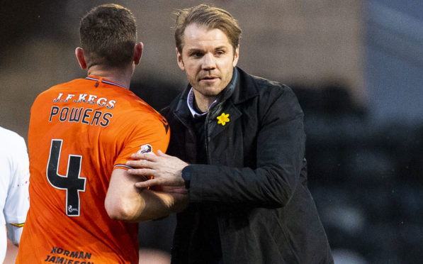 Robbie Neilson, right, greets Dillon Powers at end of Partick game.