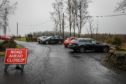 Our picture shows Forestry Land and Scotland staff closing public car parks as the public is not listening to Government advice and walking and running in groups.