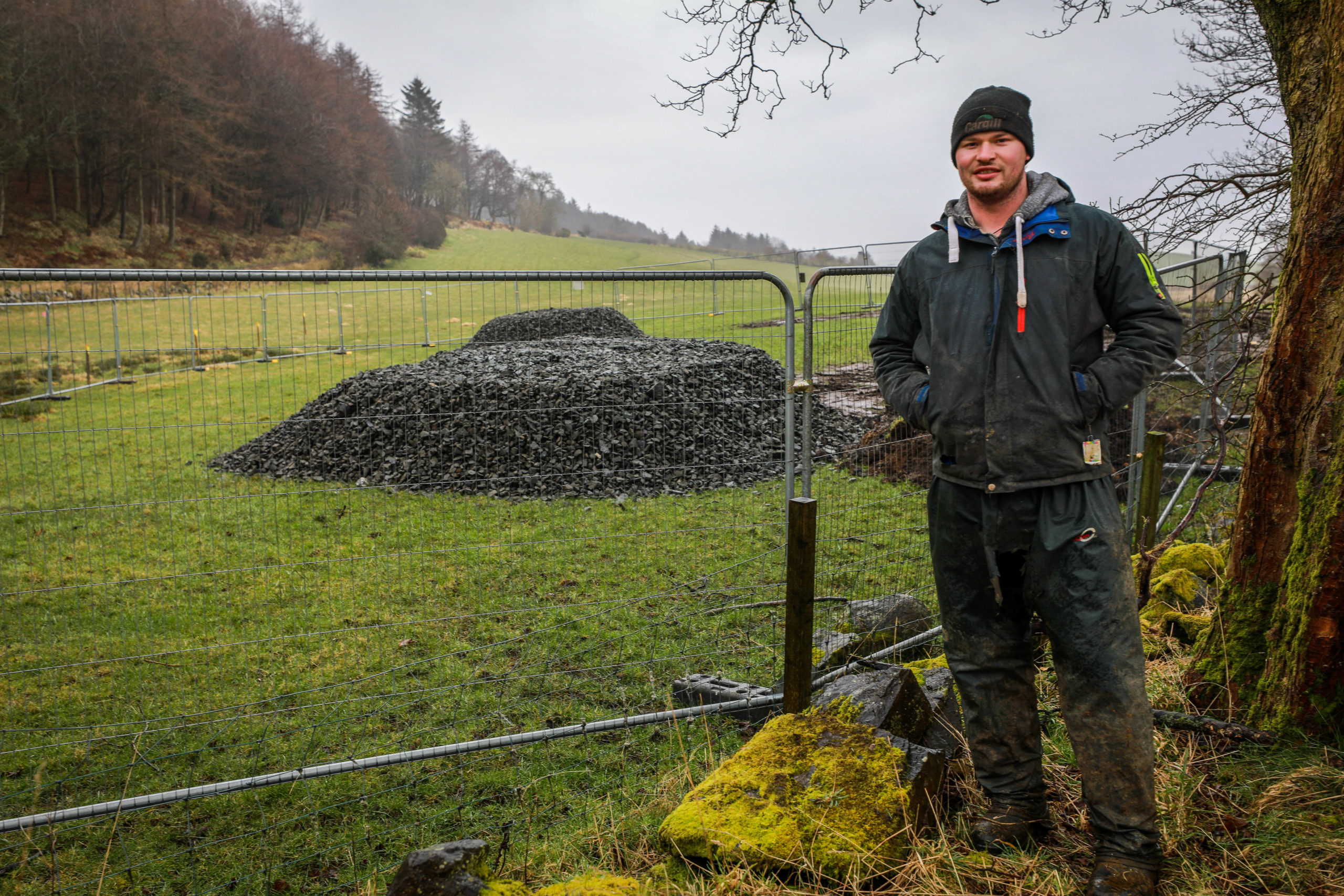 Farmer Andrew Stevenson at the site of the sinkhole after it was filled in by the Coal Authority.