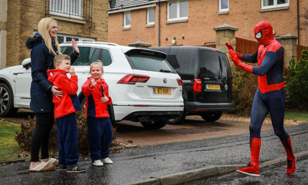 Dave is waved off by wife Kirsten, son Liam and daughter Lucy.