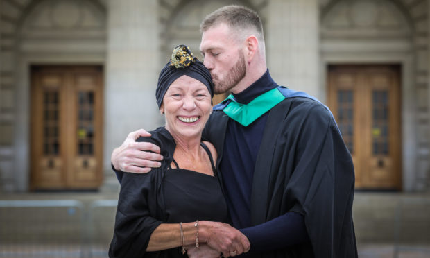 Matilda Latronico with son Sam Latronico, 27, from Perth who graduated in Ethnical Hacking. Mhairi Edwards/DCT Media