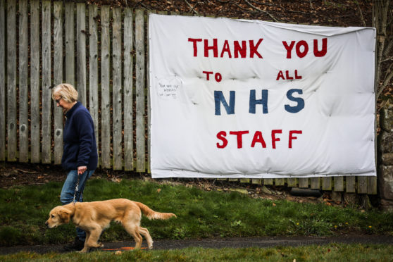 A 'thank you to all NHS staff' banner close to Ninewells Hospital in Dundee.