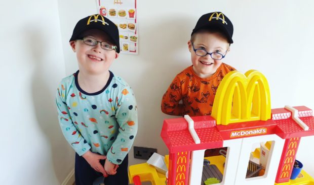 Ollie, left, and Cameron Scougal enjoyed a home 'drive-thru' McDonalds during lockdown as a 7th birthday treat.