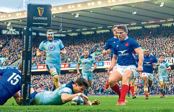 Scotland's Sean Maitland scores his side's second try during a Guinness Six Nations match between Scotland and France at BT Murrayfield Stadium.