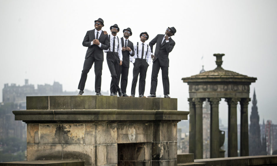 In 2019, The Black Blues Brothers, five Kenyan acrobats, performed some of their Edinburgh Festival Fringe show on Edinburgh's Calton Hill during their first ever visit to Scotland.