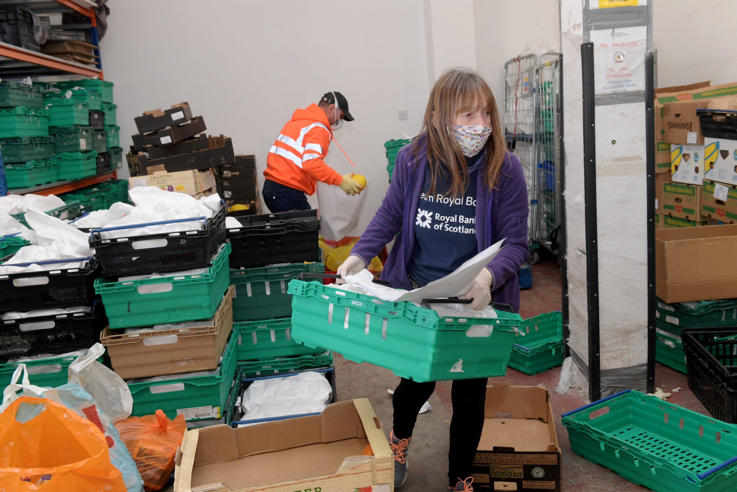 Volunteers at Community Food Initiatives North East sorting out food deliveries.