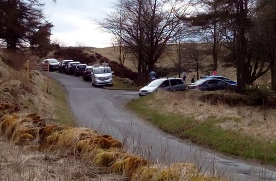 People parked on the verge outside Craigmead car park in the Lomonds before Easter despite Government advice to stay close to home.
